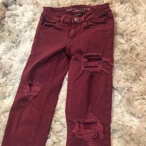 American Eagle size 00 low rise ripped red jegging